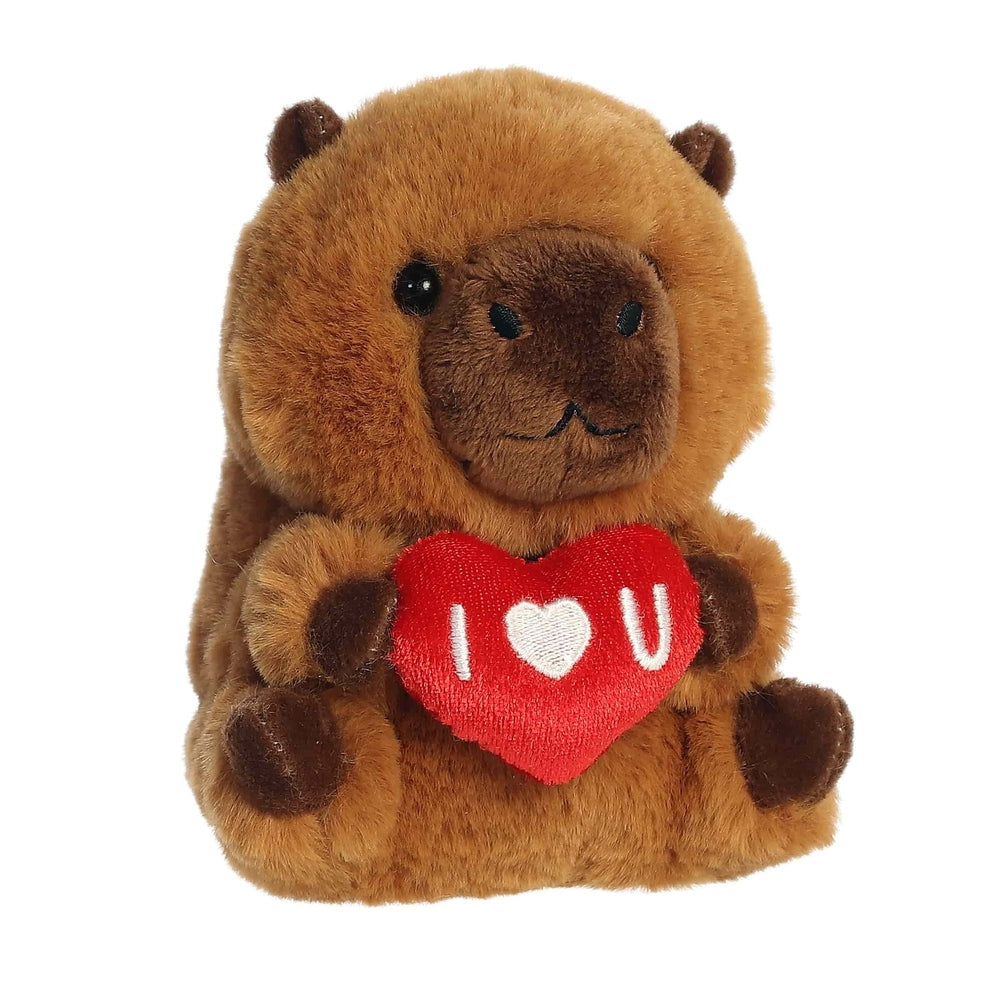 Brown plush capybara stuffed animal holding a red heart that says I heart U.