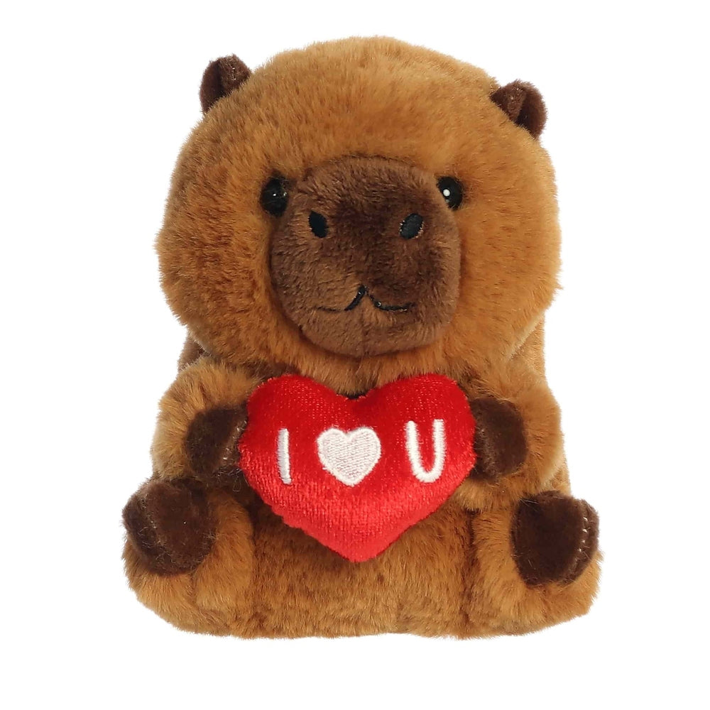 Brown plush capybara stuffed animal holding a red heart that says I U