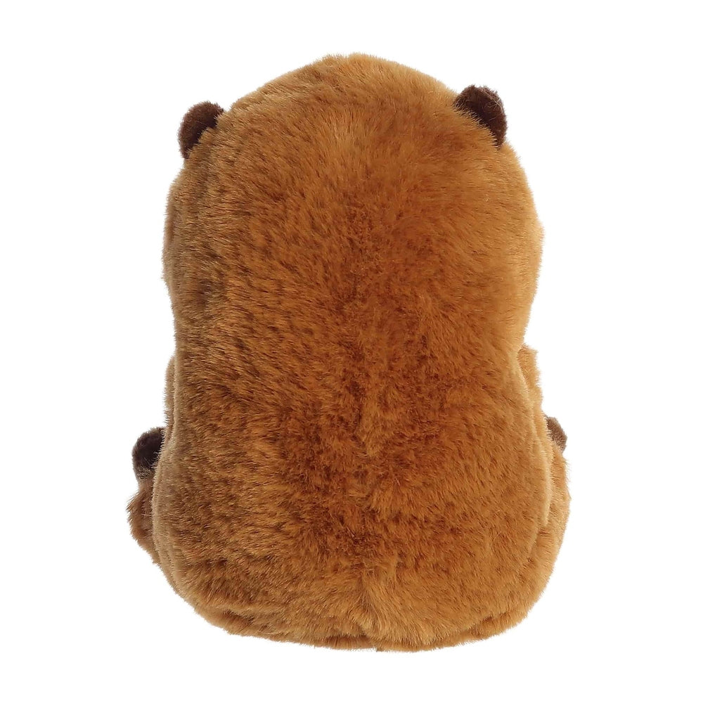 Back view of brown plush capybara stuffed animal with small dark ears