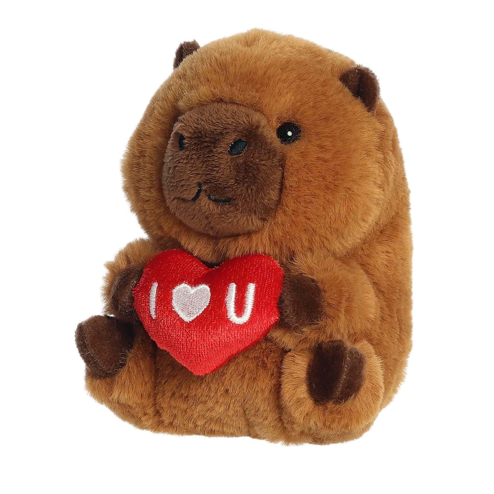 Brown plush capybara stuffed animal with fluffy fur, holding red heart that says I U.
