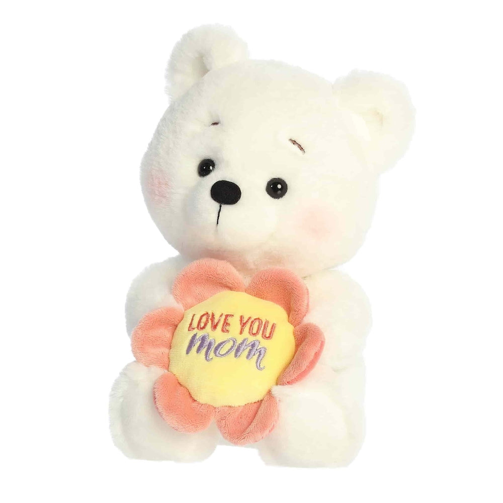 Aurora 8-inch plush bear in white, holding a peach flower with a yellow center reading Love You Mom