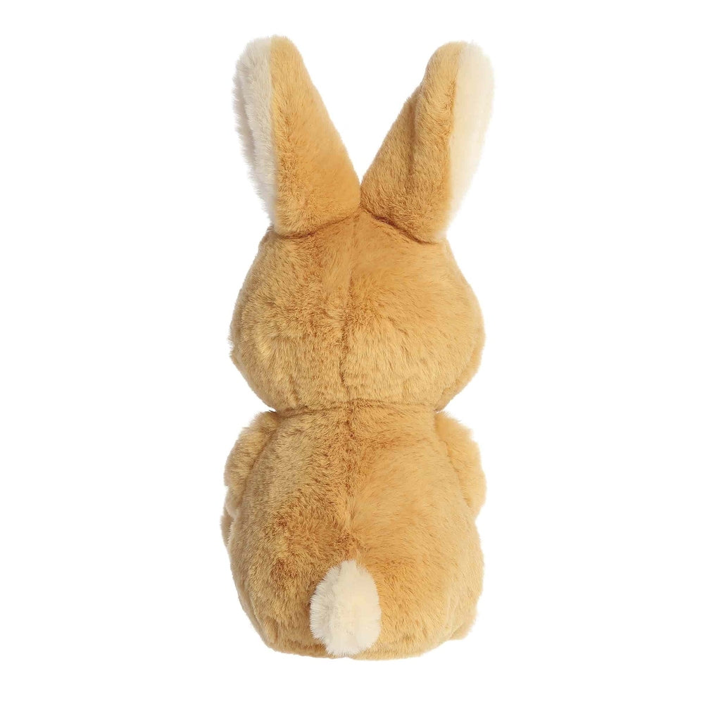 Aurora 10-inch plush bunny stuffed animal in orange-tan with white tail, back view