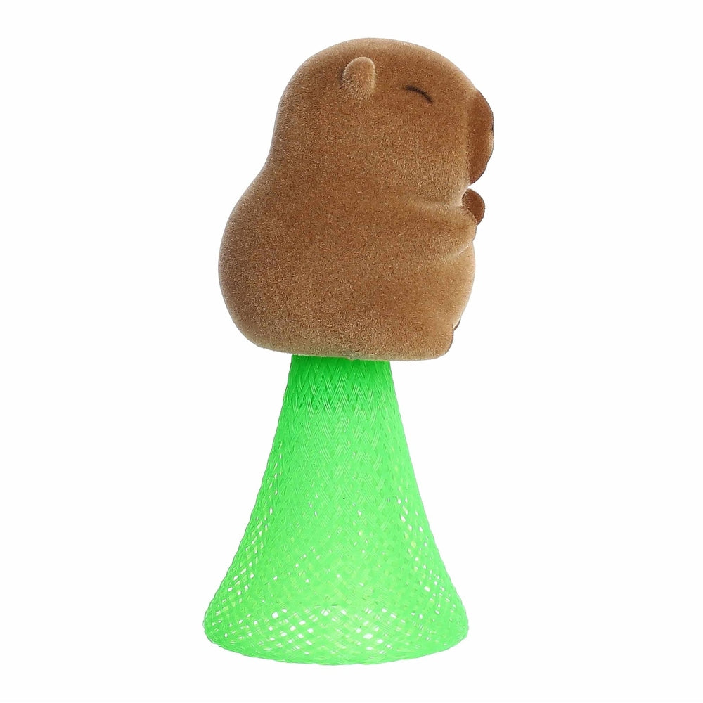 Aurora Toys Capybara Poppers 4 plush perched on a bright green cone stand for playful popping action.