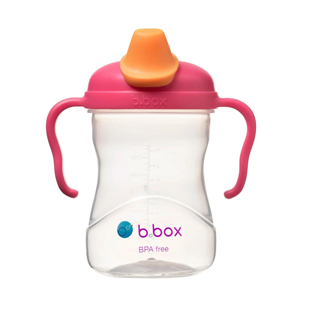 B.Box Spout Cup with pink handles and orange spout, BPA-free sippy cup designed for easy grip and sipping.