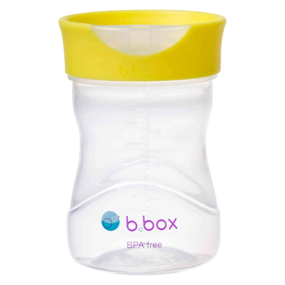 B.Box Training Cup with bright yellow lid and BPA-free clear body, designed for easy grip.