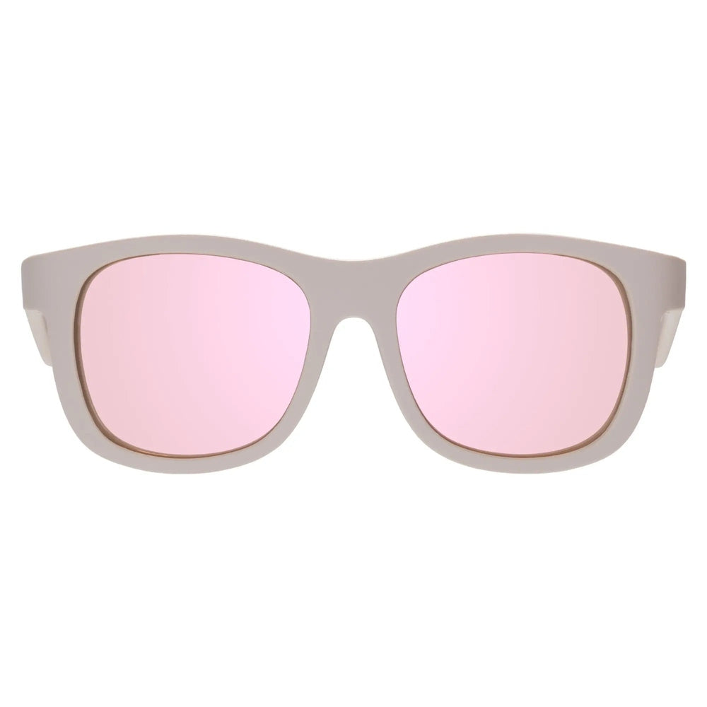 Babiators Blue Series Navigator Polarized Sunglasses for kids, warm grey frame with pink mirrored lenses, ready to wear.