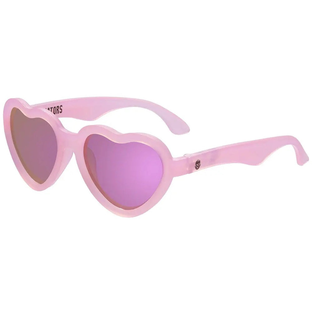 Babiators Heart Shape Polarized Sunglasses Pink for kids, pink frame with purple lenses shown ready to wear.