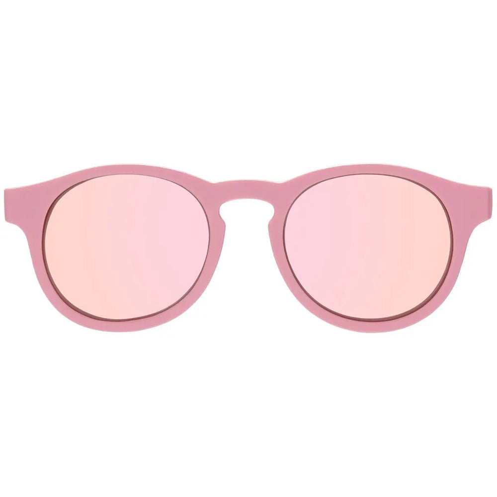 Babiators Polarized Mirrored Sunglasses Pretty In Pink with pink frames and keyhole bridge on white backdrop