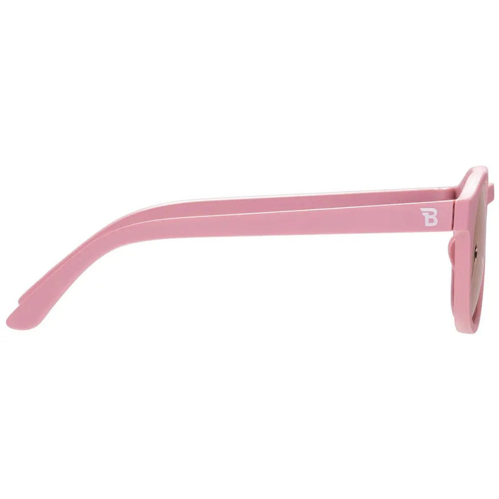 Babiators Polarized Mirrored Sunglasses Pretty In Pink, side view of pink frame with white B logo on temple.