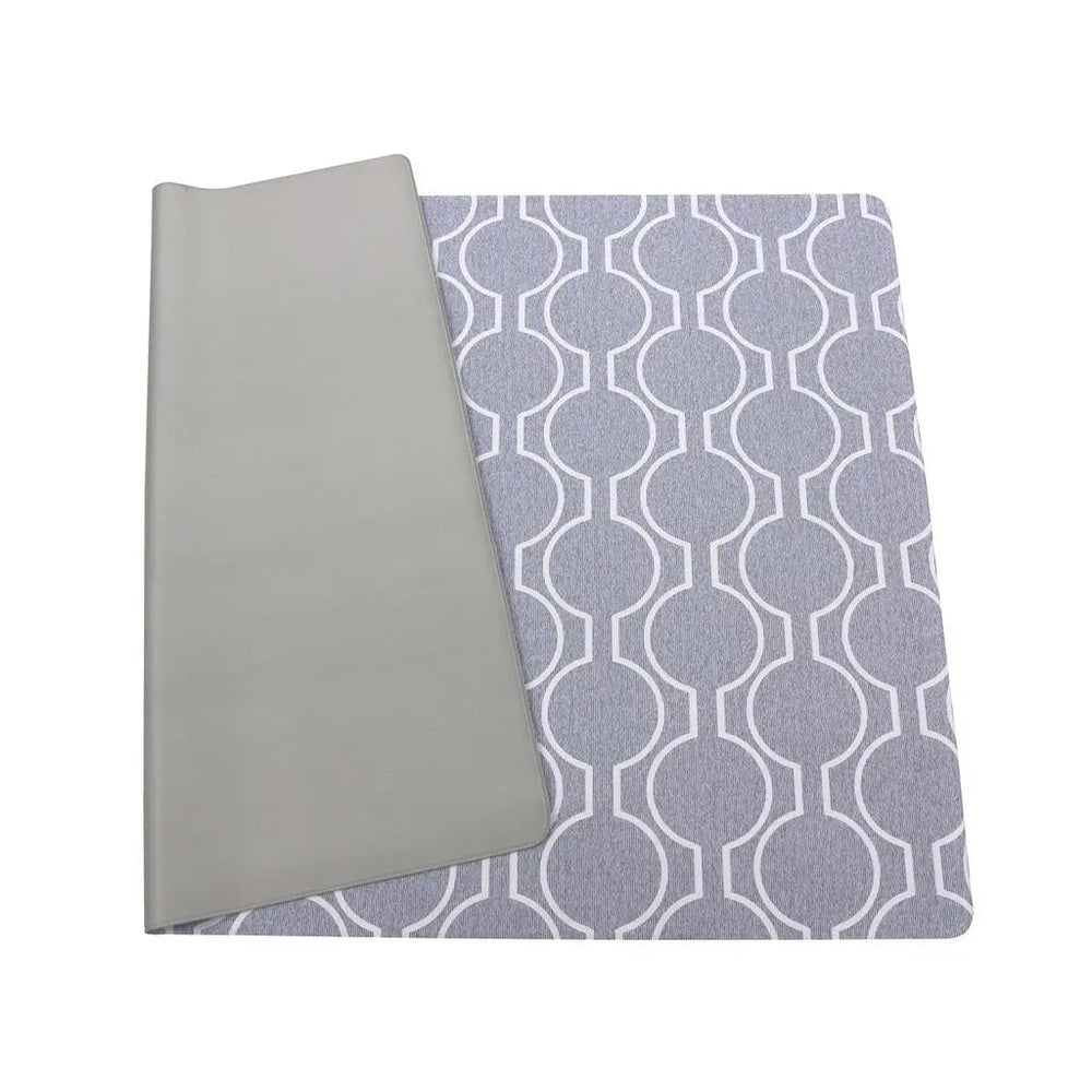 Baby Care Multi Mat: two-layer grey play mats with a geometric circle pattern, one folded to reveal the soft underside.
