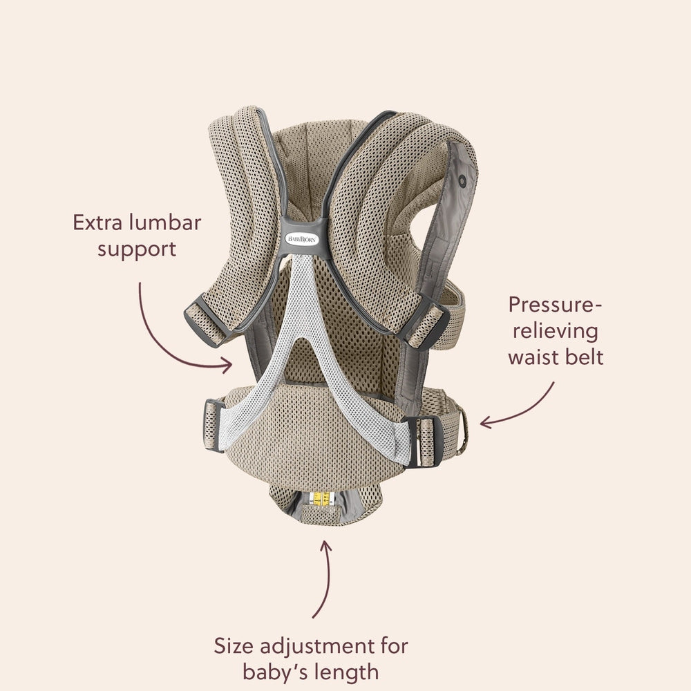 BabyBjorn Baby Carrier Free beige, back view with adjustable straps, lumbar support, and pressure-relieving waist belt.