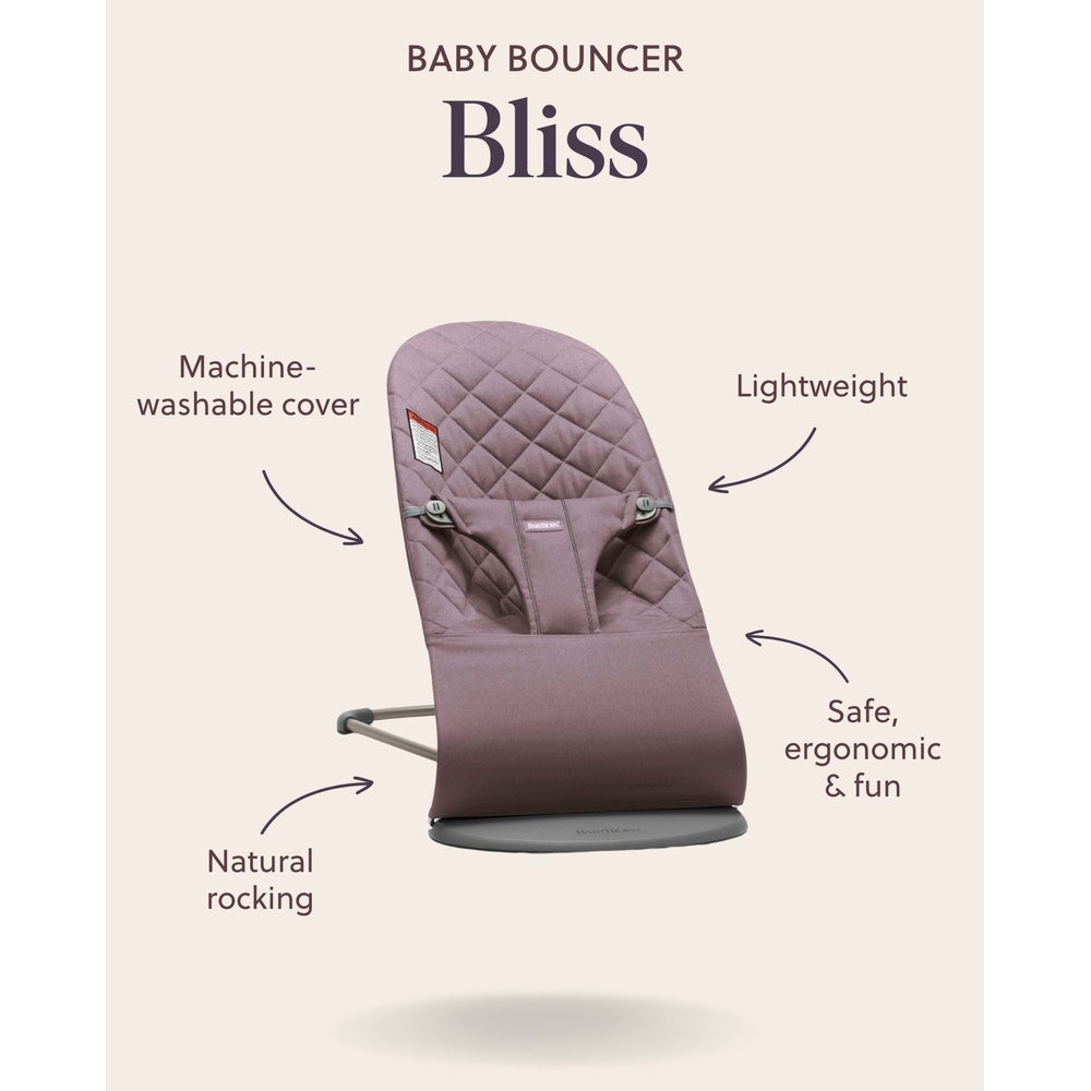 BabyBjorn Bouncer Bliss in dusty rose with quilted cover, showing lightweight, machine-washable fabric and gentle rocking.