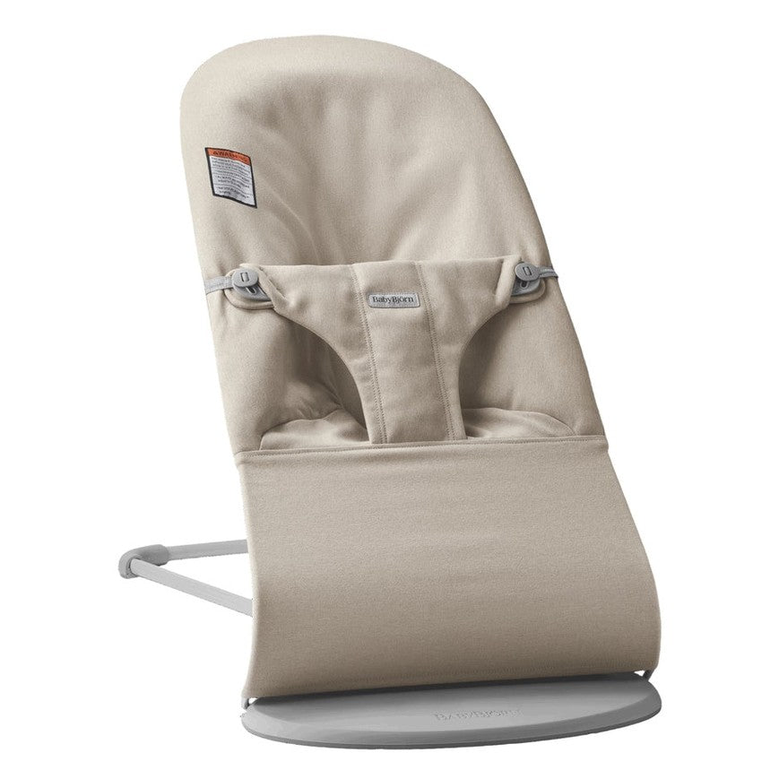 BabyBjorn Bouncer Bliss beige fabric infant bouncer with gray frame and base.