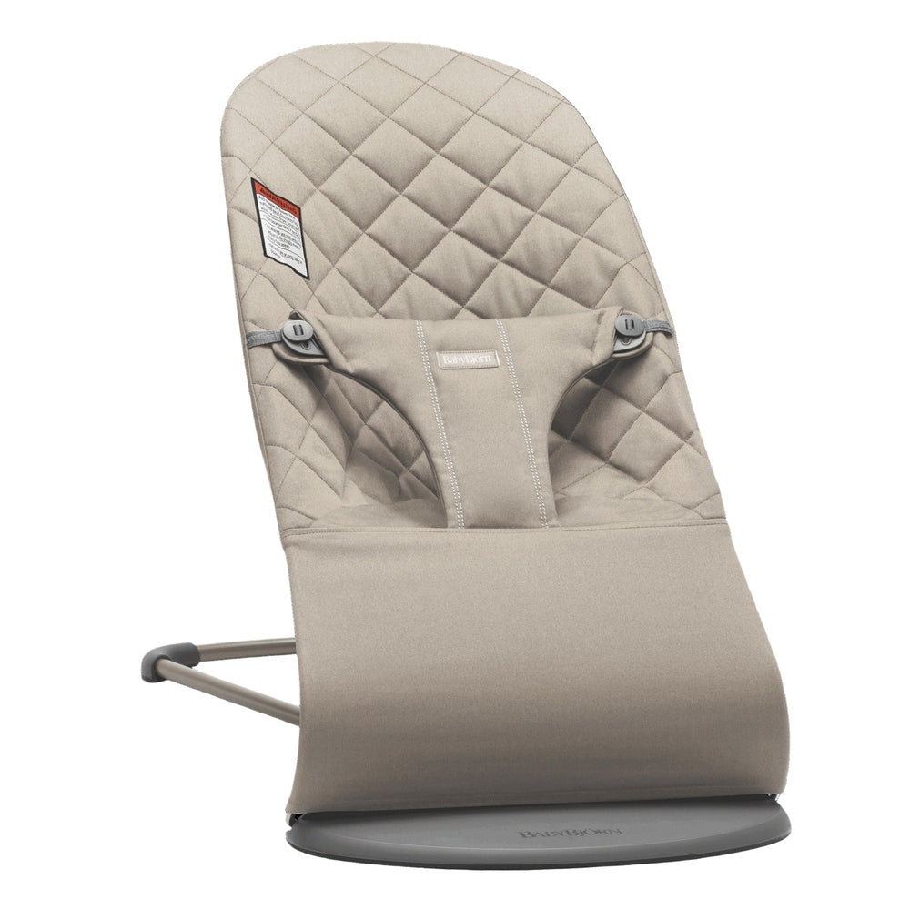 BABY BJORN Bouncer Bliss beige fabric with quilted back, harness, and curved base ready for soothing rocking.