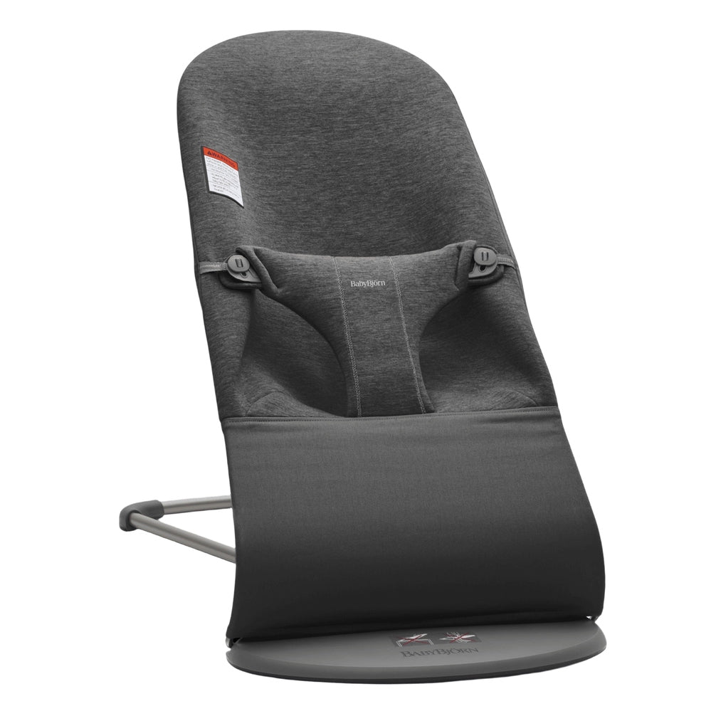 BabyBjorn Bouncer Bliss baby bouncer in charcoal gray fabric, rocking gently on its circular stand.