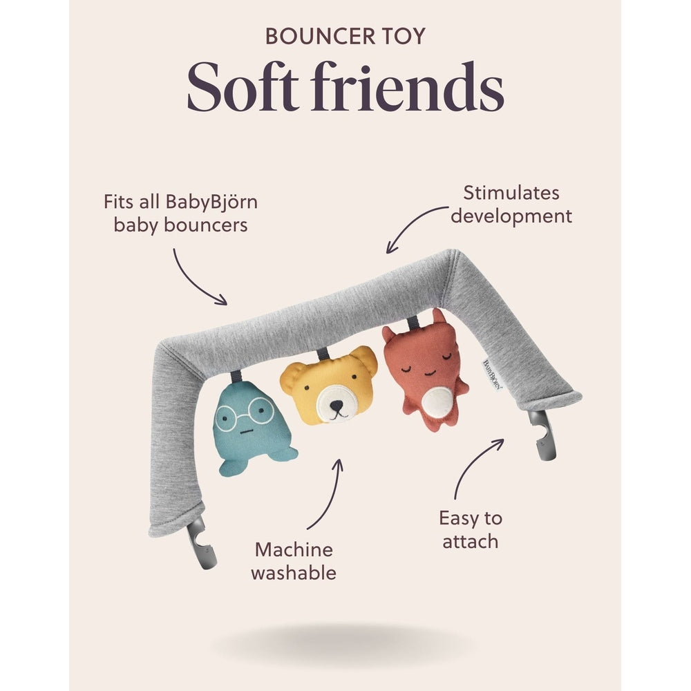 BabyBjorn Bouncer Toy with gray arch and three hanging plush friends; easy to attach and machine washable.