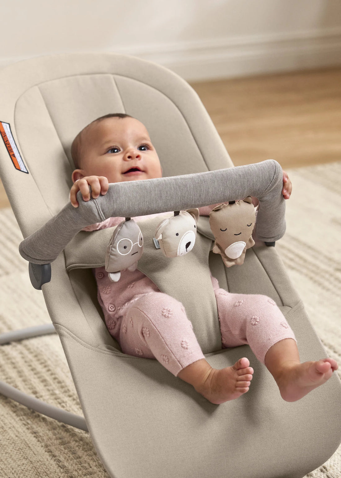 BabyBjörn Soft Friends Bouncer Toy — official lifestyle view (Neutrals)