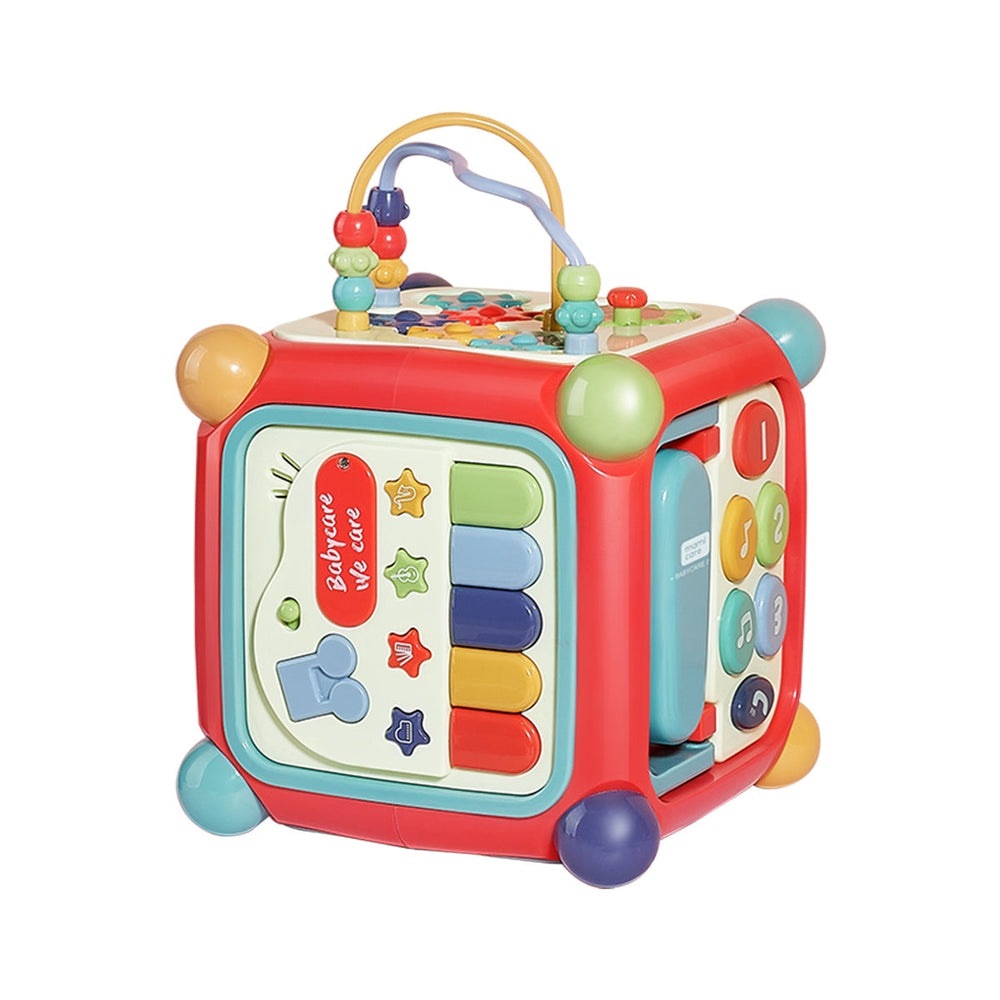 BC BABYCARE LEARNING ACTIVITY BOX, a bright red cube with bead maze top and colored buttons being pressed.
