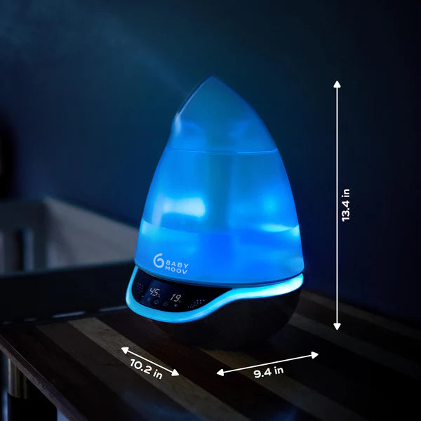 Babymoov Hygro Plus 3-In-1 Baby Humidifier, blue LED glow illuminates the black base.