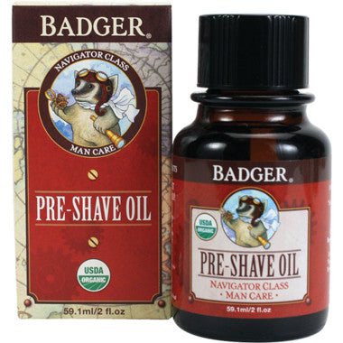 Badger Navigator Class Man Care Pre-Shave Oil bottle and box, red labels, organic badge.