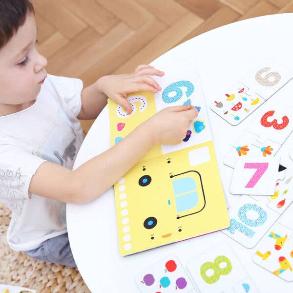 Banana Panda Kids Academy Numbers 3+ activity set featuring a yellow bus-themed book and colorful number cards.