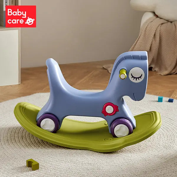 BC Babycare 2-In-1 Rocking Horse: blue pony on lime-green curved rocker with purple wheels, ready for riding.