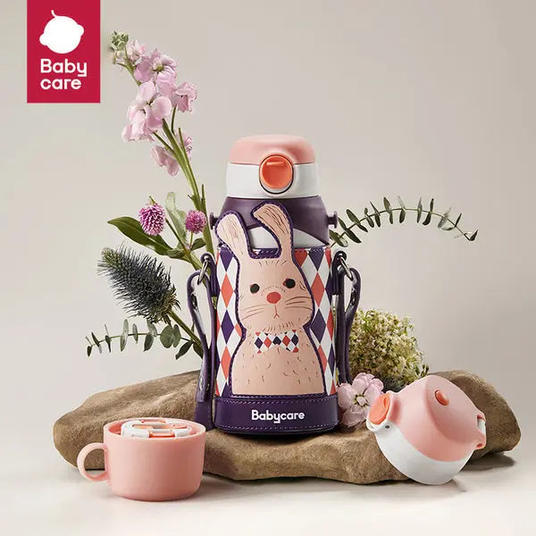 BC Babycare 3 In 1 Vacuum Bottle 600 ml in purple bunny sleeve with pink lid, shown beside a pink cup.