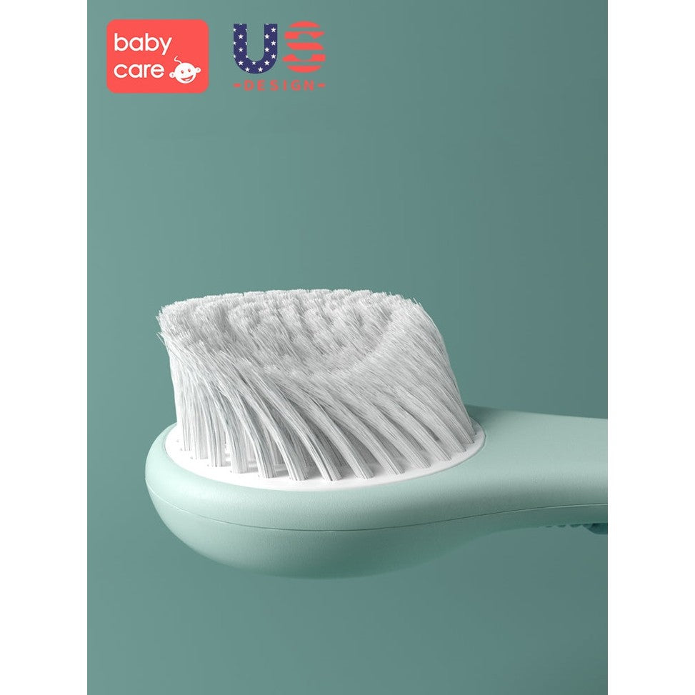 BC Babycare green baby comb and brush set with white bristles