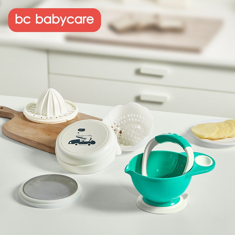 BC Babycare green baby food masher set with masher bowl and accessories