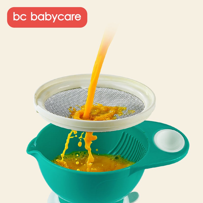 BC Babycare baby food masher in green with draining mesh strainer