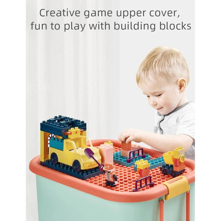 BC Babycare building blocks storage box with orange rim; child plays with colorful bricks and toy vehicles
