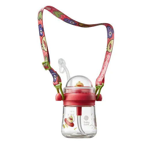 BC Babycare Fairy Water Cup sippy bottle with colorful adjustable strap and red lid.