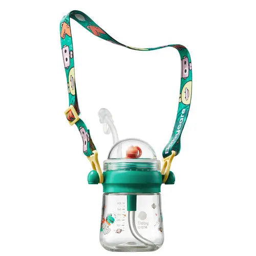BC Babycare Fairy Water Cup with teal bottle, green lid and straw, emoji strap worn for easy carry