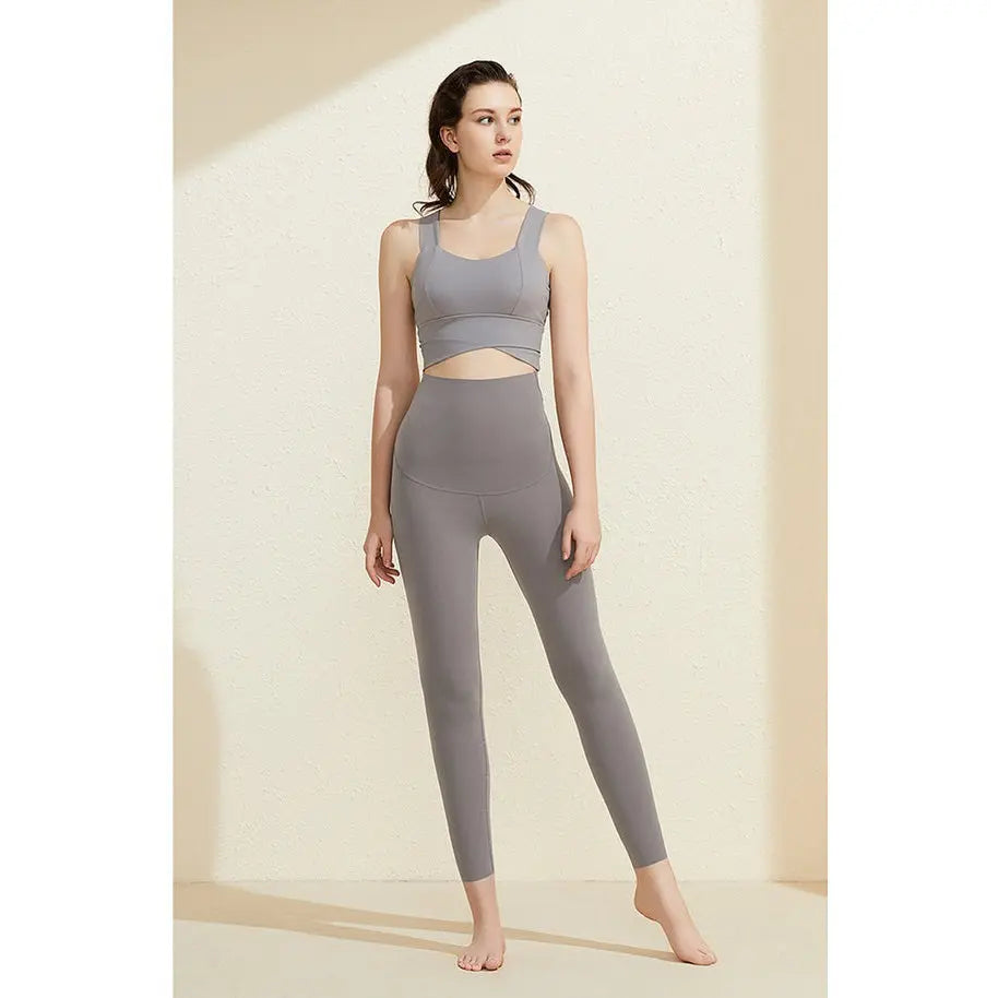 BC Babycare Free Cutting Maternity Pants Grey, model showcases high-waist, stretchy maternity leggings during a relaxed shoot.