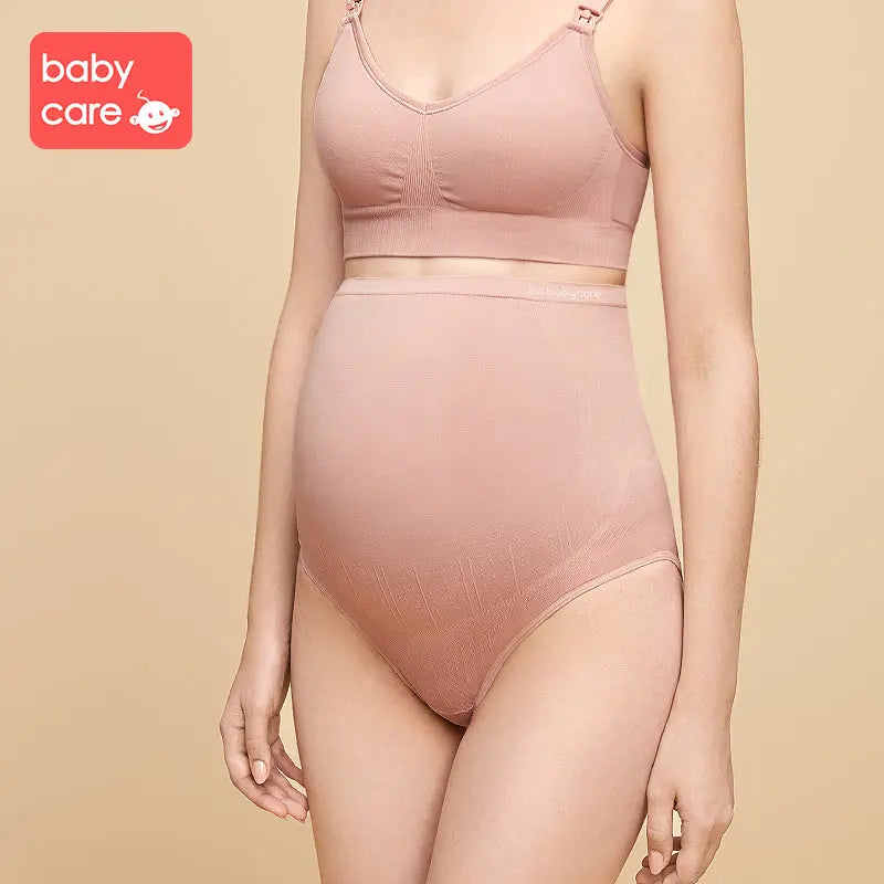 Bc Babycare Maternity High Waisted Underwear Pink worn by a pregnant model, showcasing seamless soft fabric and full coverage.