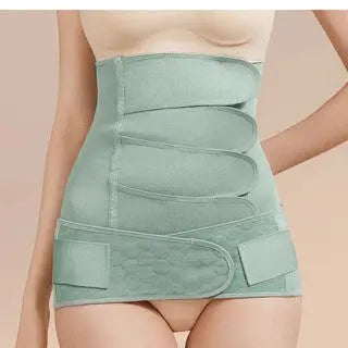 BC Babycare Modal Postpartum Belly Wrap Band in green, worn around the waist with adjustable Velcro closures.