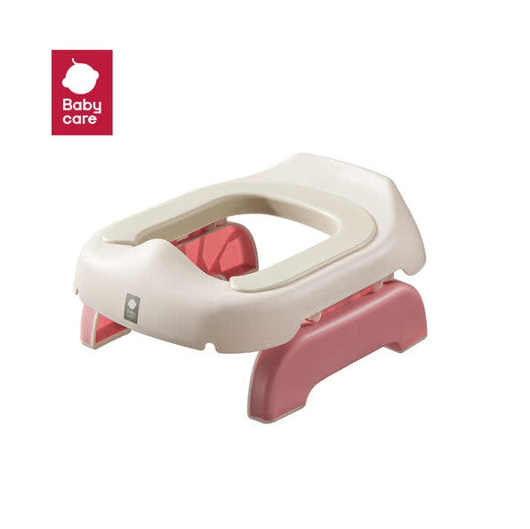 Bc Babycare Portable Toilet Stool, pink legs and white seat, for potty training.