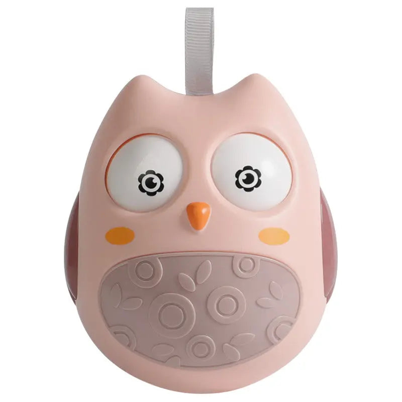 BC Babycare Roly Poly Toy Owl, pink plastic owl with textured belly and large animated eyes, hanging loop.