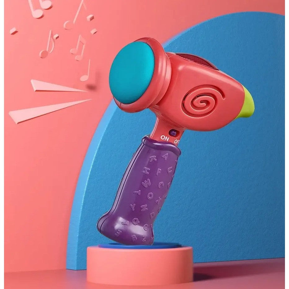 BC Babycare Sound & Light Toy Hammer - red head, teal face, purple alphabet-pattern handle, switch visible on pink display stand
