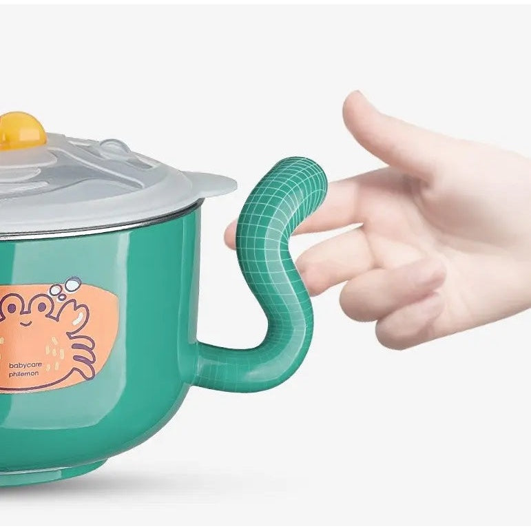 BC Babycare Stainless Steel Feeding Set 5Pcs green pot with grey lid and teal textured handle held by hand