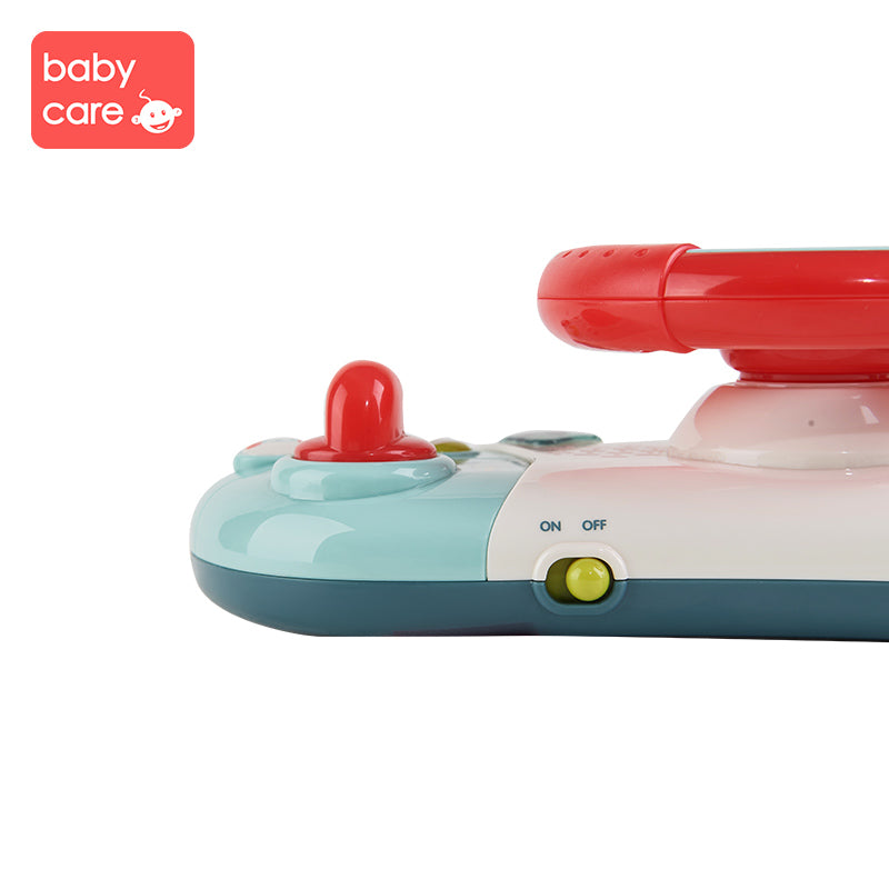BC Babycare Steering Wheel Toy, colorful plastic infant toy with red wheel, blue base, and green on/off switch