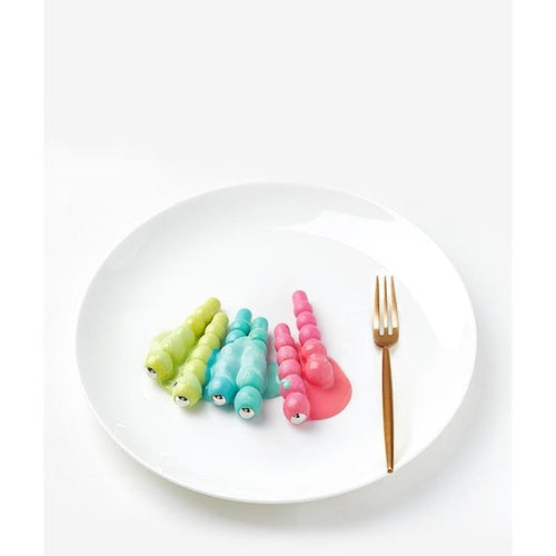 BC Babycare Woodpecker catching and feeding toy set; four colorful wooden pieces on a white plate with a gold fork