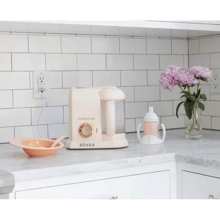 BEABA Babycook Solo baby food maker in rose gold on a marble countertop