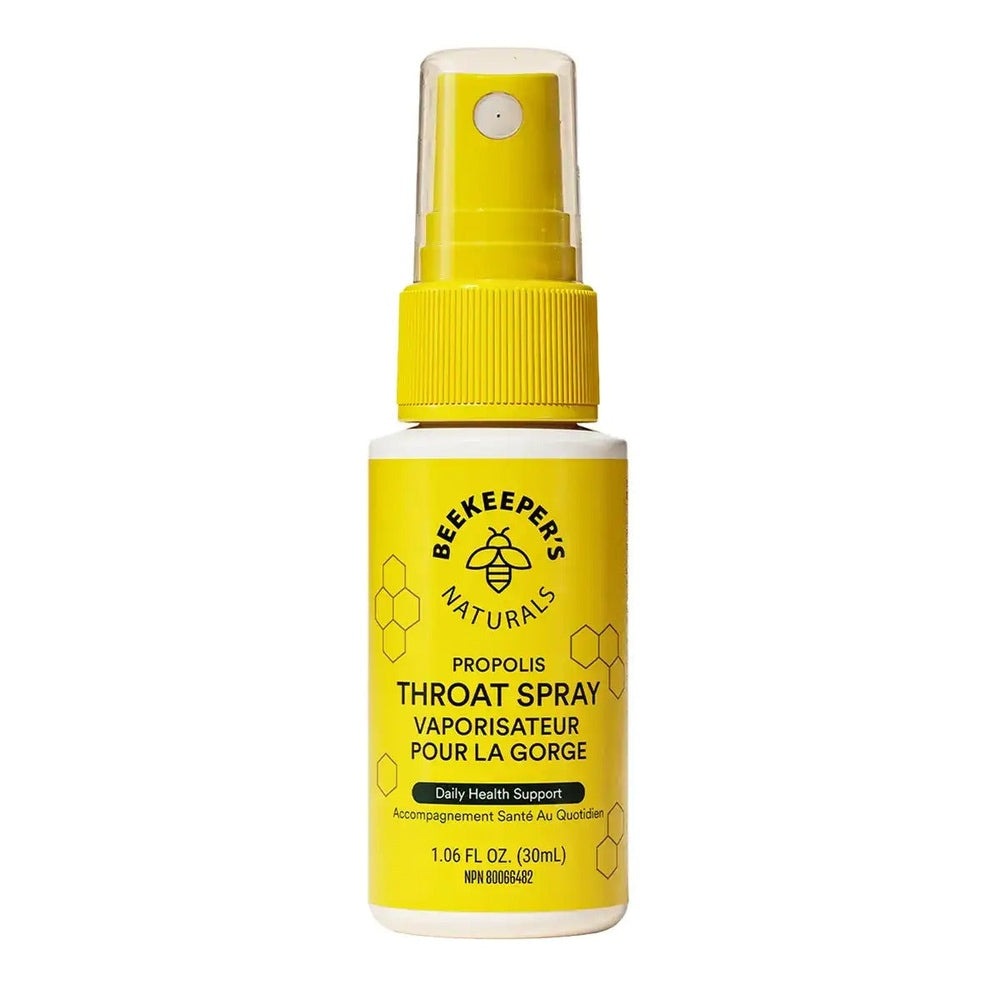 Beekeeper's Naturals Propolis Throat Spray 30 ml, yellow bottle with spray nozzle ready for throat care.