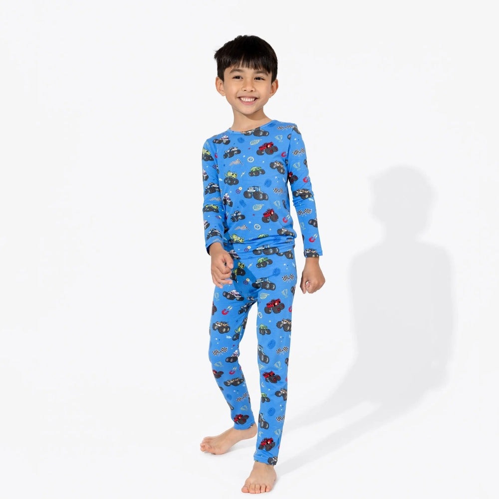 Bellabu Bear Bamboo Kids Pajamas Blaze and the Monster Machines: smiling boy in blue printed pajama set, ready for bedtime.