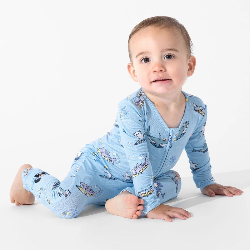 Bellabu Bear Bamboo Convertible Footie Shark School in blue, baby crawling in zippered, footed sleepwear.