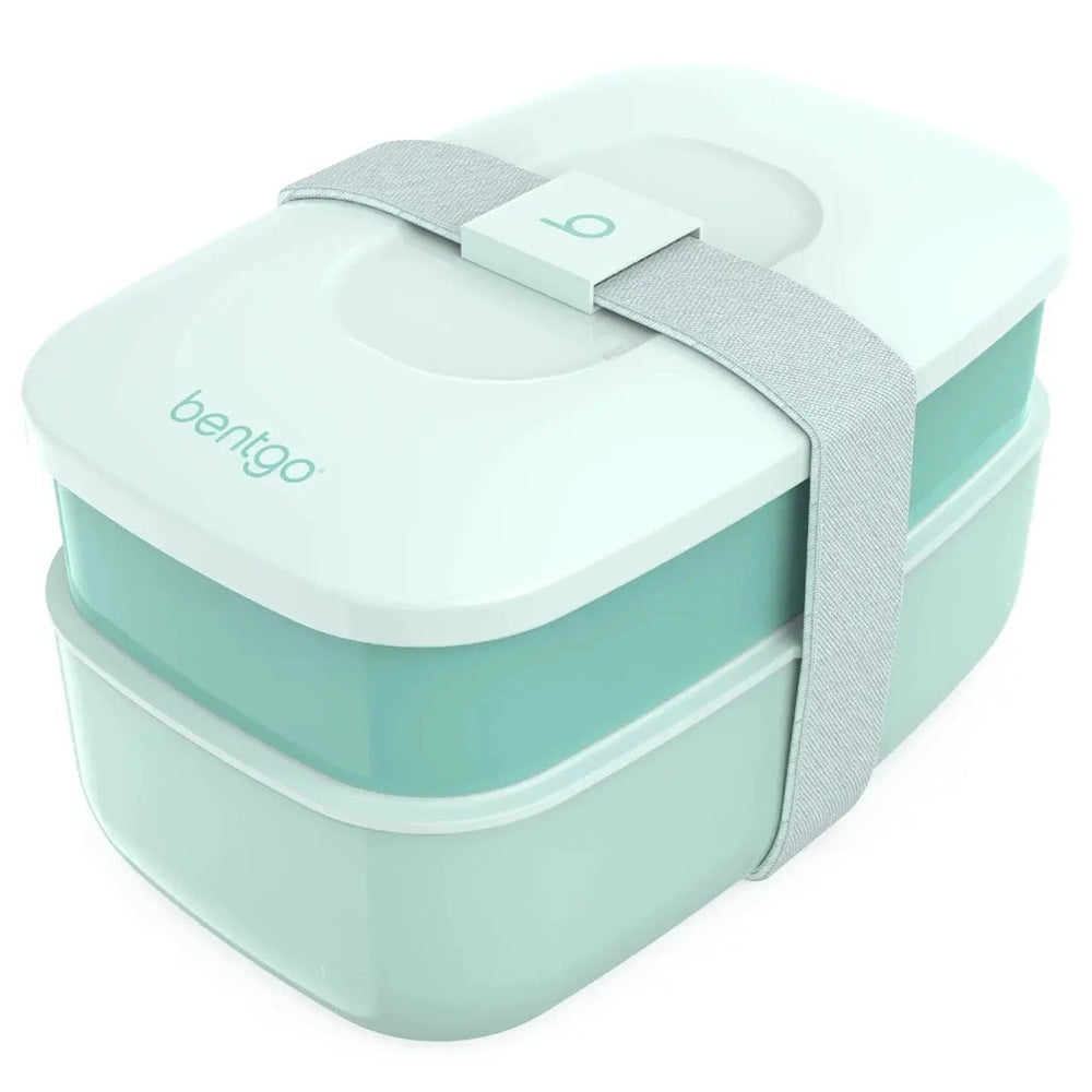 Bentgo Classic Two-Tier Lunch Box in mint green, secured by a gray strap buckled over the lid