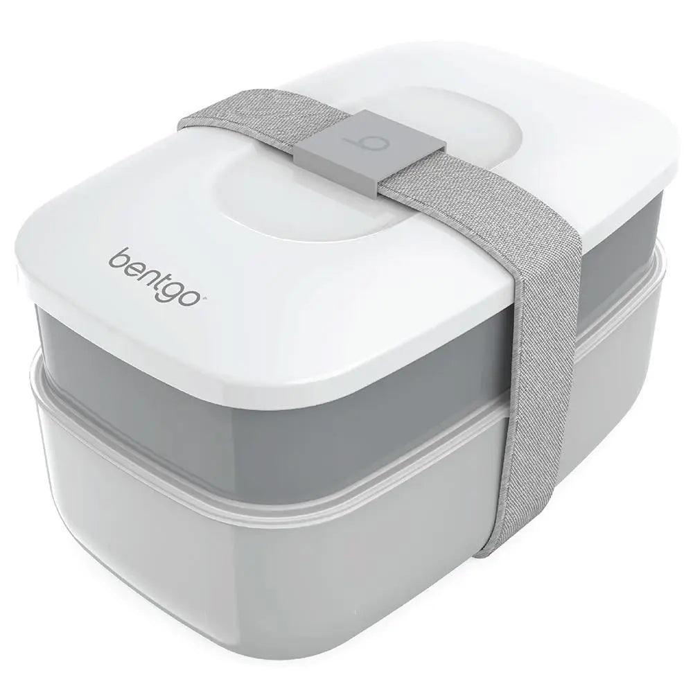 Bentgo Classic Two Tier Lunch Box, white lid and gray base, strapped shut with a gray band.