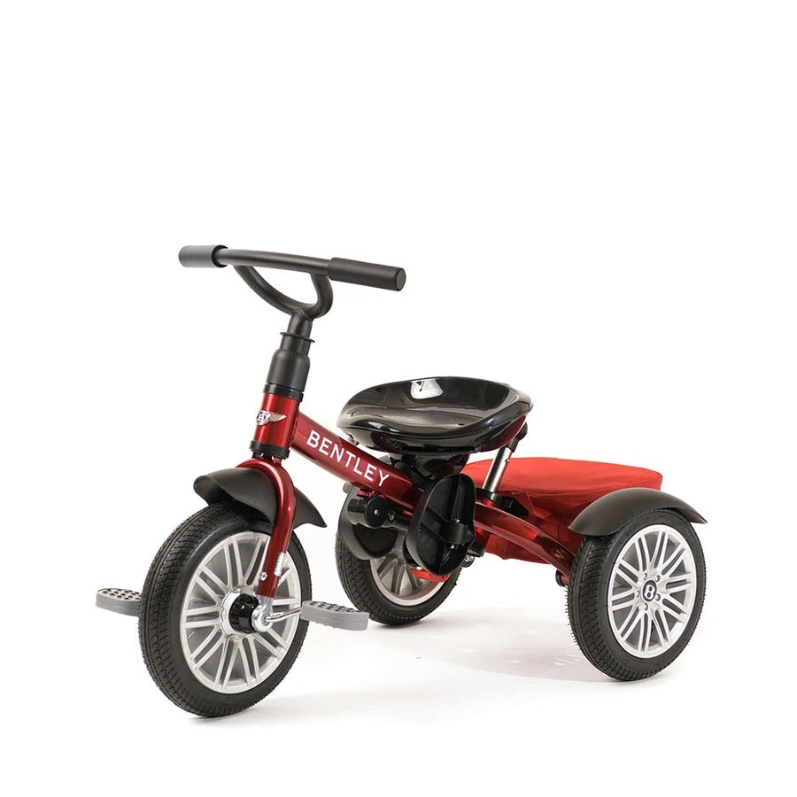 Bentley Trike 6-in-1 V2 Dragon Red toddler tricycle with red frame, black seat and three-spoke wheels.