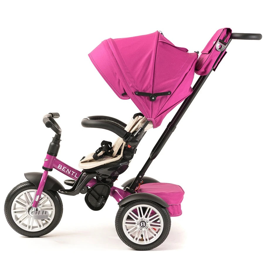 Bentley Trike 6-In-1 V2 Fuchsia Pink with canopy raised and push handle extended, three-wheel design